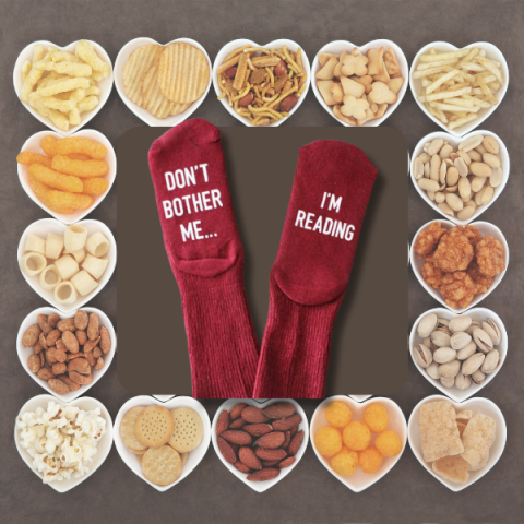 Socks that read "Don't bother me...I'm reading" on surrounded by snack bowls shaped like hearts