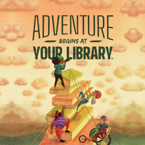 Picture of children climbing on books with someone in a wheelchair overlooking them.